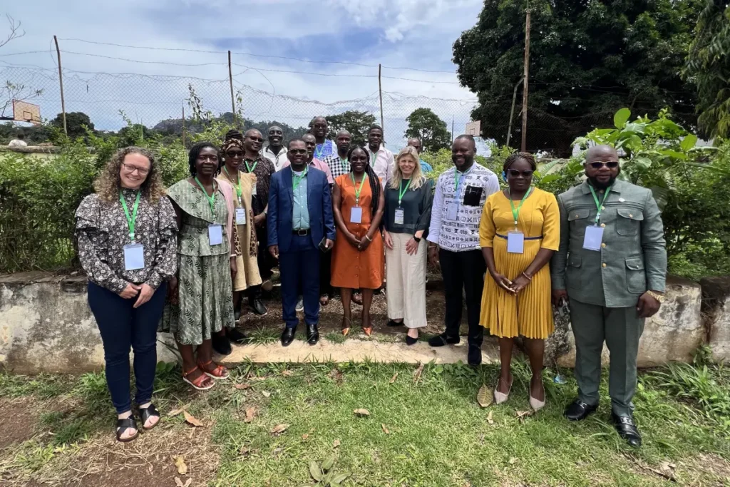 Participants of the facilitator's training workshop pose for a group picture.