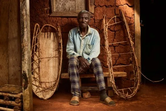 A hunter poses next to his traditional kinga. Photo by Vivian Anogo / CIFOR-ICRAF
